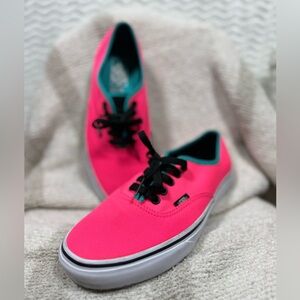Vans Women's Hot Pink Canvas Sneakers. Simple, bold style for everyday wear.